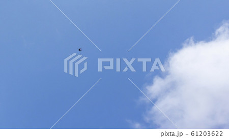 Tiny Drone High In The Sky 61203622