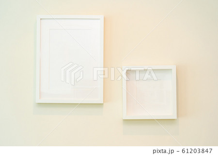 Empty photo frame on wall decoration interior 61203847