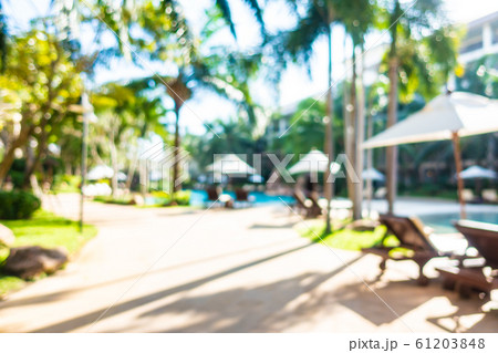 Abstract blur outdoor swimming pool in hotel resort 61203848
