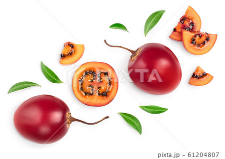 Fresh tamarillo fruit with leaves isolated on white background. Top view. Flat lay Fresh tamarillo fruit with leaves isolated on white background. Top view. Flat lay 61204807