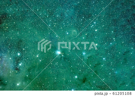 Green nebula with a bright cloud and stars. Green nebula with a bright cloud and stars. 61205108