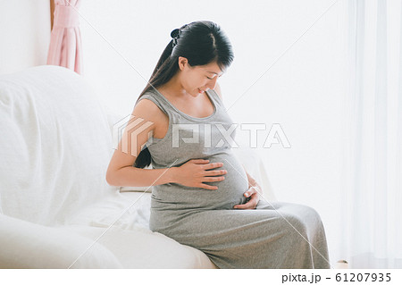 pregnant woman pregnant woman 61207935