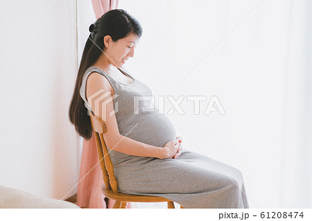 pregnant woman pregnant woman 61208474