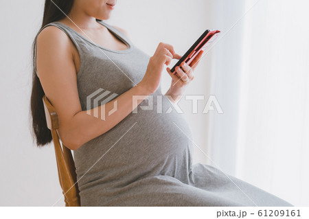 pregnant woman pregnant woman 61209161