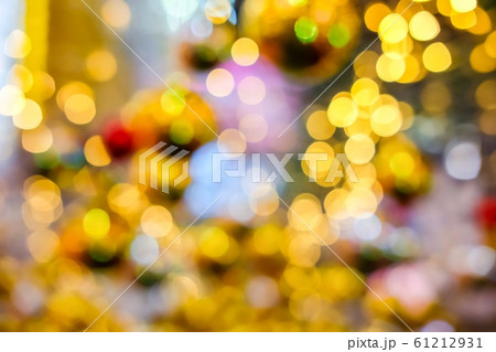 Orange, yellow and white bokeh light at Festival. Abstract or blurred of light glitter. Glow texture background. 61212931