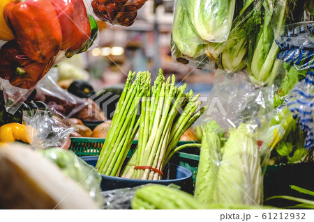 Fresh Asparagus officinalis put on table with Various vegetables at local market. 61212932
