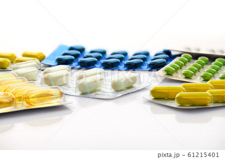 Various tablets, pills and vitamins in blister 61215401