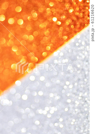 Silver and gold defocused glitter backround. Silver and gold defocused glitter backround. 61216620