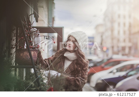 stylish woman in a fashionable coat stylish woman in a fashionable coat 61217527