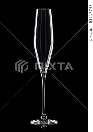 Empty luxury champagne glass isolated on a black background Empty luxury champagne glass isolated on a black background 61217747