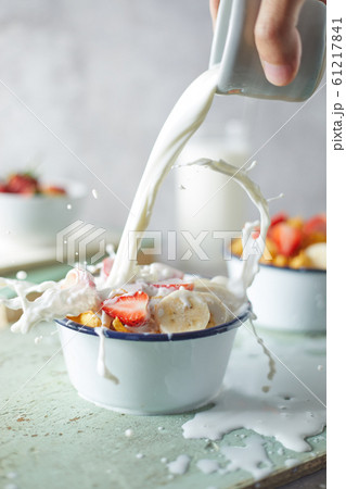Bowl with cornflakes on background.. 61217841