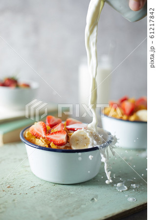 Bowl with cornflakes on background.. 61217842