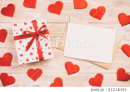 Envelope Mail with Red Heart and gift box over Envelope Mail with Red Heart and gift box over 61218101