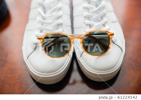 Sunglasses on a white shoes Sunglasses on a white shoes 61224542