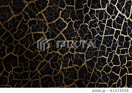 Black background in Golden grunge texture, natural texture cracks Golden elements. Black background in Golden grunge texture, natural texture cracks Golden elements. 61225056