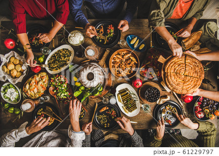 Turkish family celebrating at table with Turkish family celebrating at table with 61229797