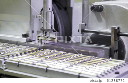 Robot  arm pick small machined parts to next 61238772
