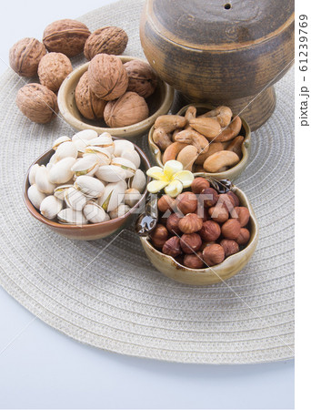 nuts or hazelnuts nuts and mix nut on a background 61239769