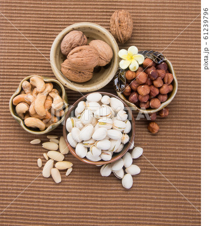 nuts or hazelnuts nuts and mix nut on a background nuts or hazelnuts nuts and mix nut on a background 61239796