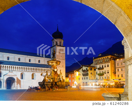 Fountain of Neptune and cathedral on Piazza Duomo in Trento in evening Fountain of Neptune and cathedral on Piazza Duomo in Trento in evening 61240286