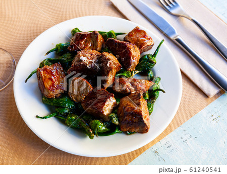 Slices veal of sauce. Tacos de ternera. Spanish dish Slices veal of sauce. Tacos de ternera. Spanish dish 61240541