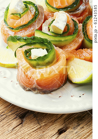 Rolls of salmon with cream cheese 61243585