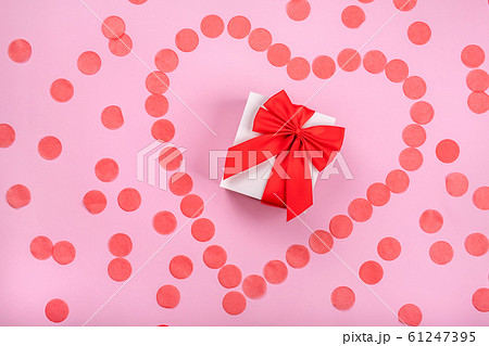 Gift box and confetti 61247395