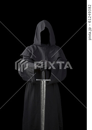Ghostly figure with medieval sword isolated on black 61249382