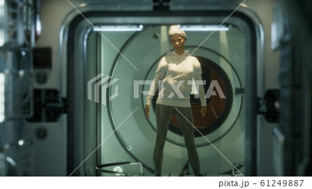 Woman astronaut on a futuristic spaceship Woman astronaut on a futuristic spaceship 61249887