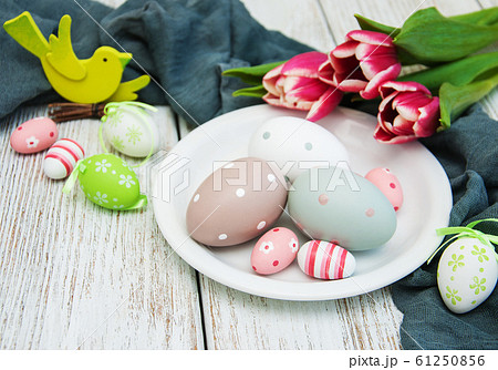 Easter eggs and tulips 61250856