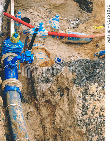 Blue water pipes and shut-off valve on pipe with Blue water pipes and shut-off valve on pipe with 61251021