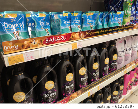 Fabric softeners packed in the plastic bottle and soft pack displayed for sale on the rack. Sorted by the brand to make it easier for customers to choose. Fabric softeners packed in the plastic bottle and soft pack displayed for sale on the rack. Sorted by the brand to make it easier for customers to choose. 61253597