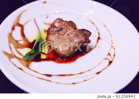Delicious fresh sliced, pan seared Foie Gras Delicious fresh sliced, pan seared Foie Gras 61256941
