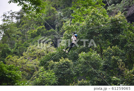 Zipline exciting sport adventure activity hanging 61259065