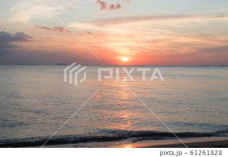 Sea pink sunset. Beautiful color clouds. 61261828