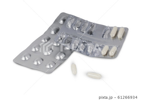 capsules pills in blister pack isolated on white 61266934