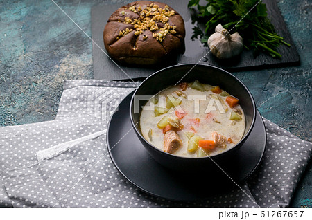 Close up Finnish traditional salmon soup with cream 61267657