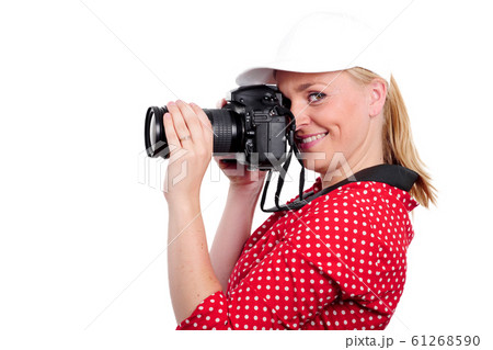 pretty blonde woman photographer with  camera, on 61268590