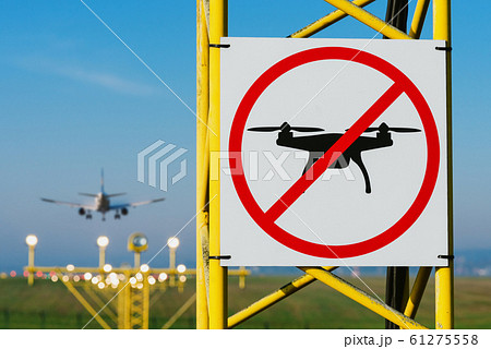 No drone zone sign on approach lighting system at runway. No drone zone sign on approach lighting system at runway. 61275558