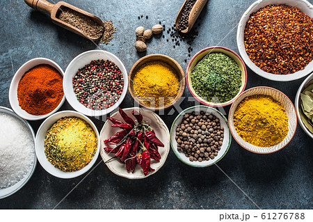 Set of variety aromatic spices and herbs in bowls Set of variety aromatic spices and herbs in bowls 61276788