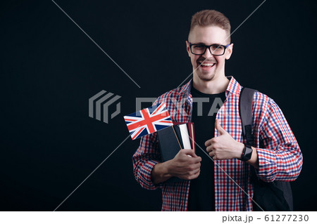 Young Male English Student Showing Thumb Up 61277230