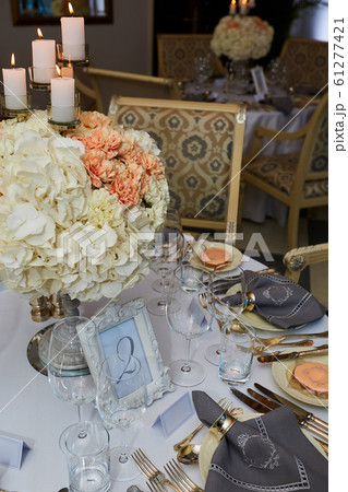 The luxury, elegant wedding reception table arrangement. The luxury, elegant wedding reception table arrangement. 61277421