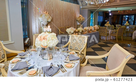 The luxury, elegant wedding reception table arrangement. 61277423