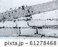 Traces of car wheels in the snow, background 61278468