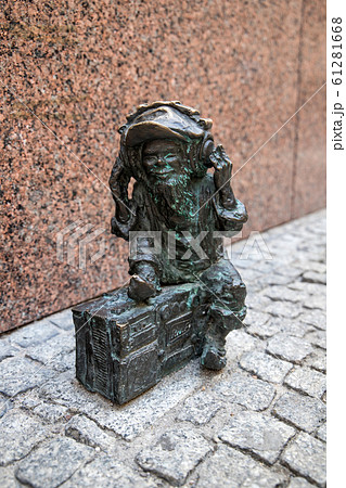 metal dwarf gnome sculpture, symbol of Wroclaw, Poland 61281668