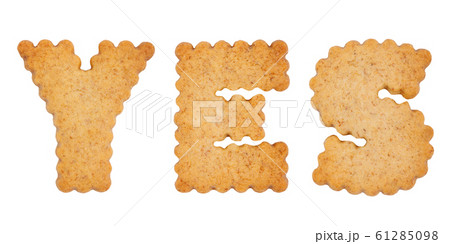 Word YES made of cookie letters isolated on white background Word YES made of cookie letters isolated on white background 61285098