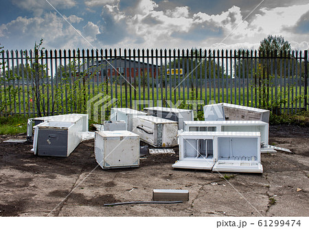 Several discarded fly-tipped fridges and freezers 61299474