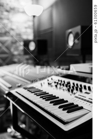 keyboard synthesizer in recording studio. black and white 61300659