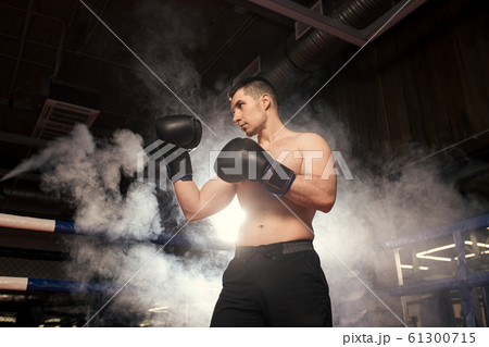 angry boxer man in fight 61300715
