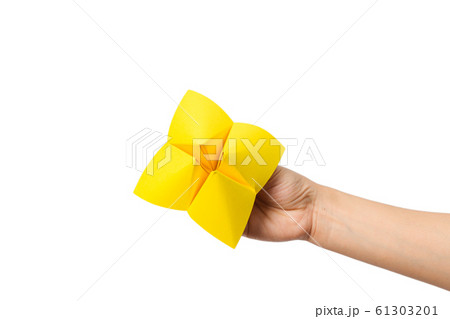 Hand in a paper fortune teller isolated on white 61303201